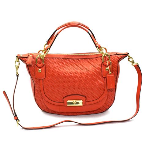 orange leather purse coach